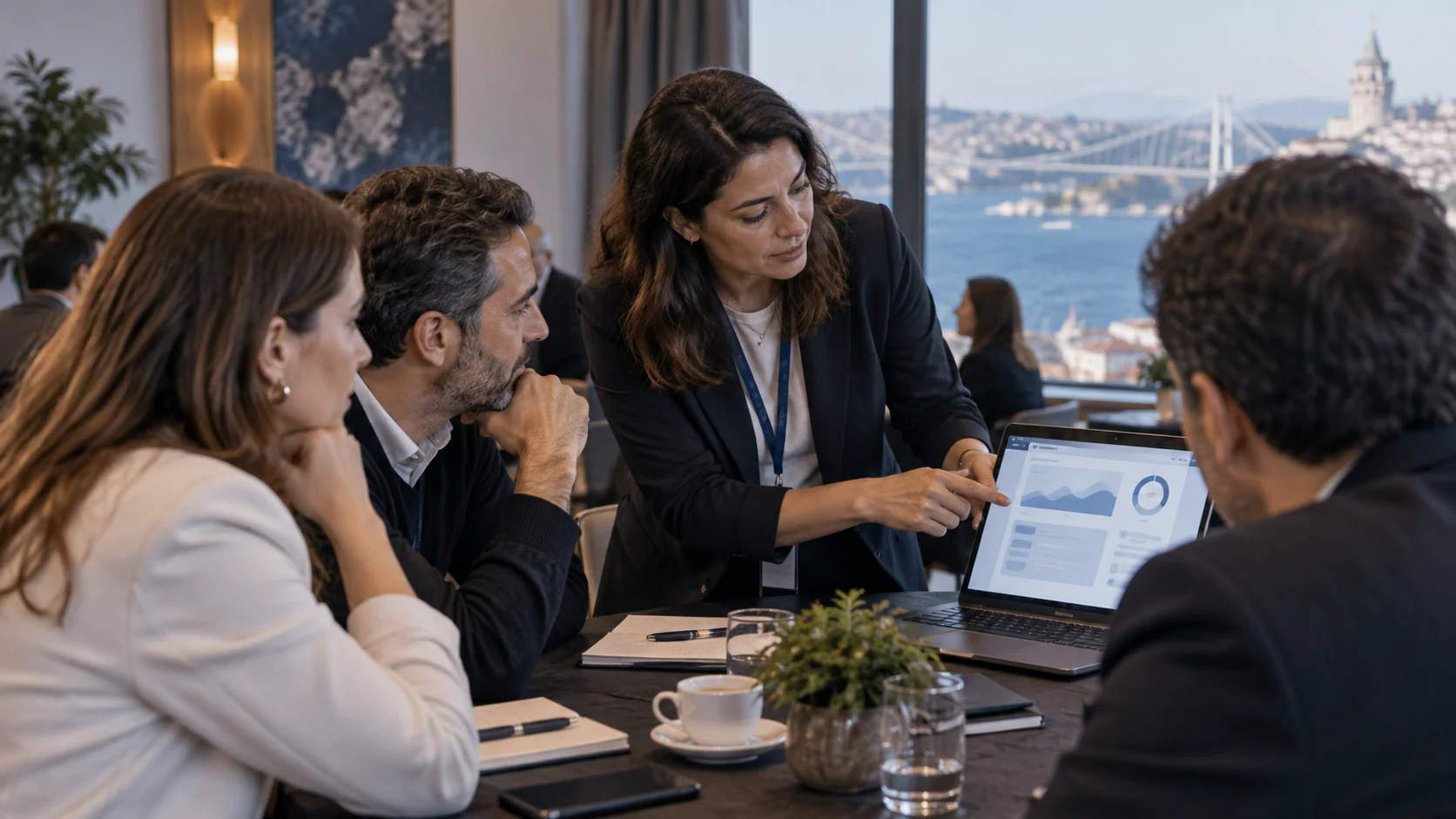 Software users discussing a workflow with a customer success specialist at a product clinic